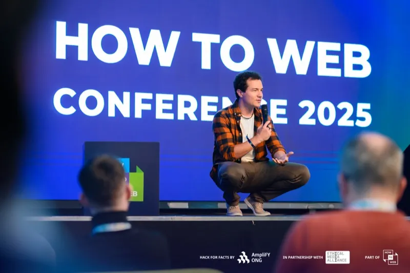 Aleodor Tabarcea on stage at the How to Web conference